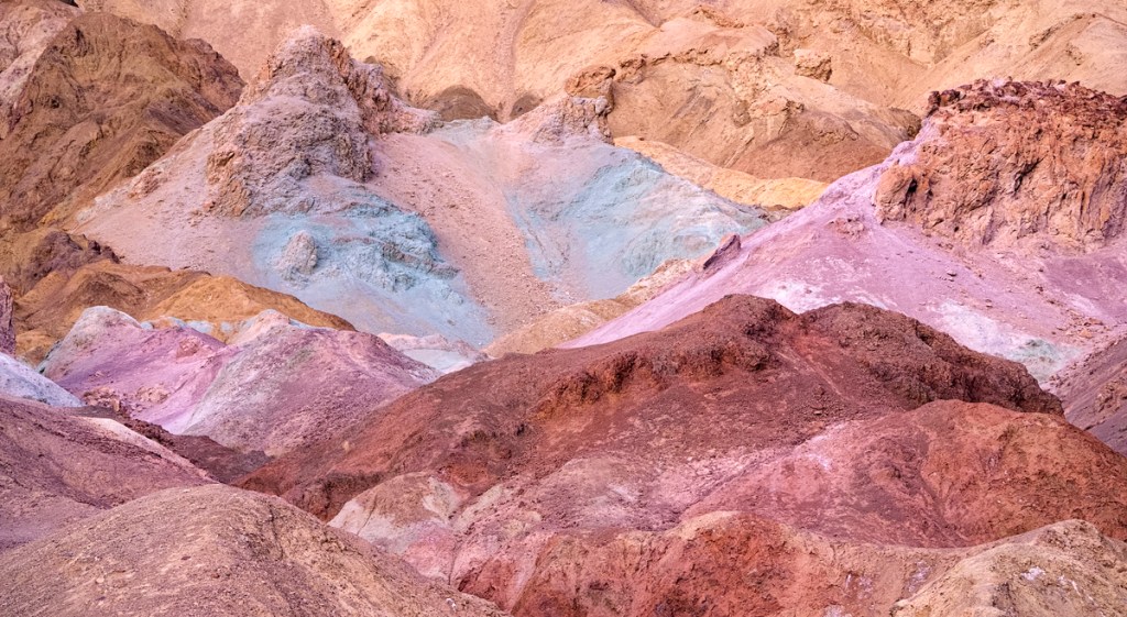 The vivid colours of Artists Palette in Death Valley in the late evening sun. If you want to reproduce colours like these in print you will need to do some soft profile to ensure the image looks right. If you don't, it's going to be very hit and miss.