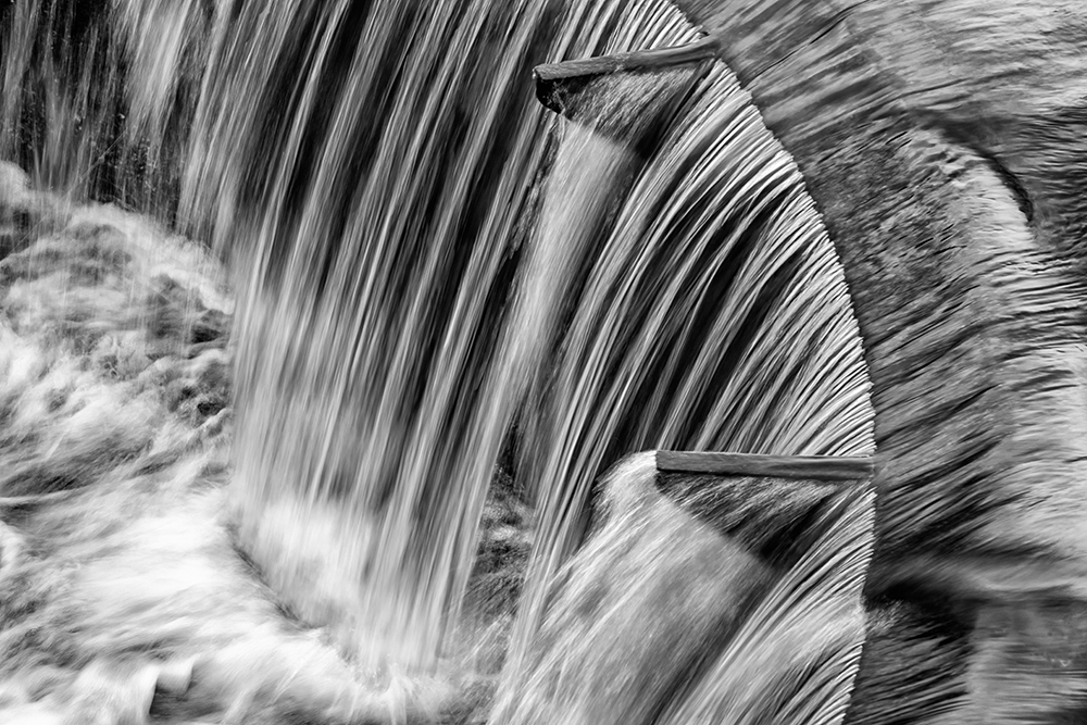 Drain in Holingworth Lake near Milnrow. Conversion in Nik Silver Efex Pro. Capture with a Sony RX10.