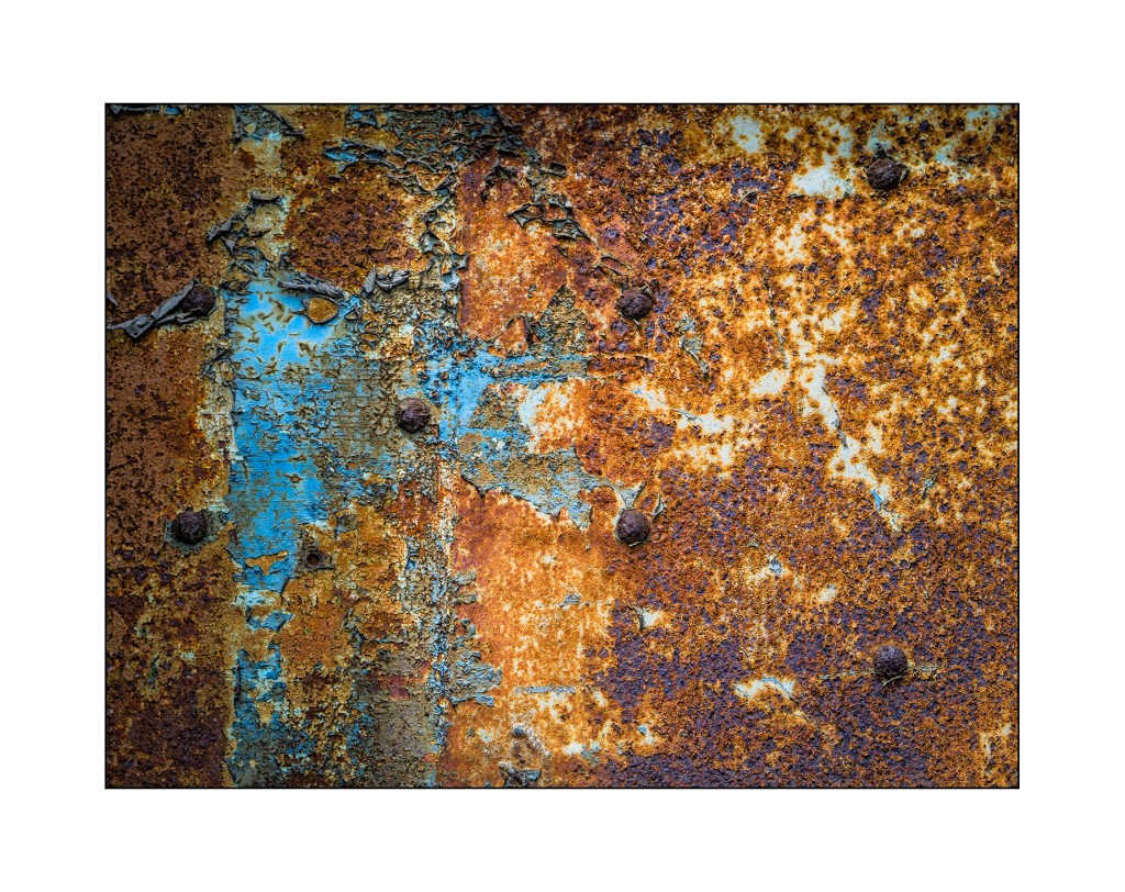 Rust - Panasonic GM1, 35-100mm lens. Processing in Lightroom with Nik Filters.