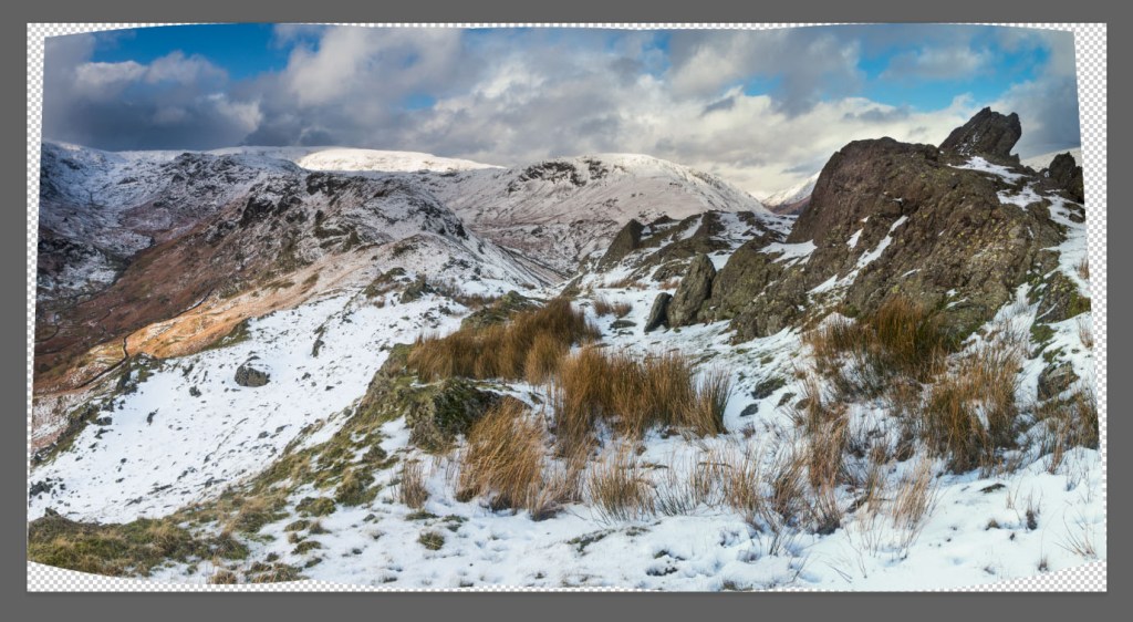 Here is the image in Photoshop with the crop removed.