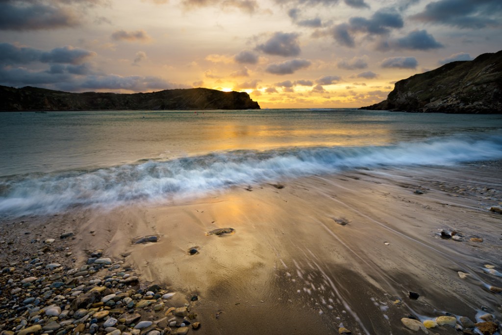 Lulworth Cove, Dorset. Sony A7r + 16-35mm Canon L lens. ISO50, f/14, 0.6" exposure. 0.6ND grad and polariser.