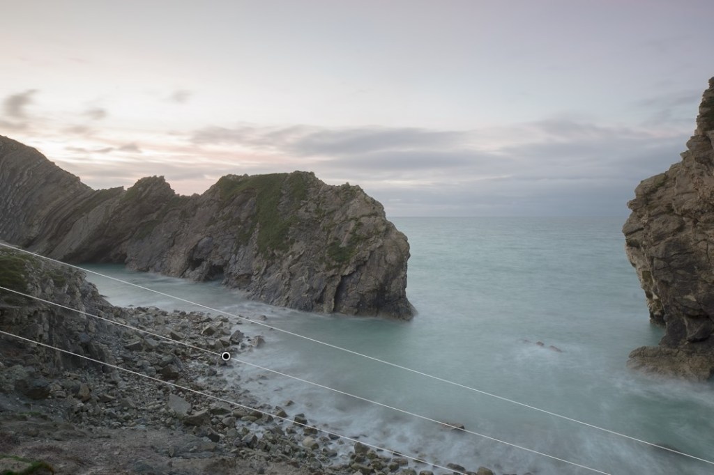 Selective darkening to the foreground rocks.