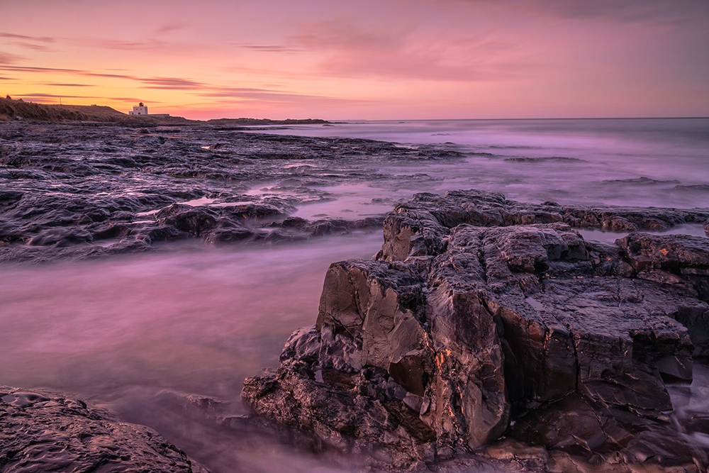 Bamburgh beach, Northumberland. Shot about 30 minutes after sunset in Winter. Canon EOS 300D.