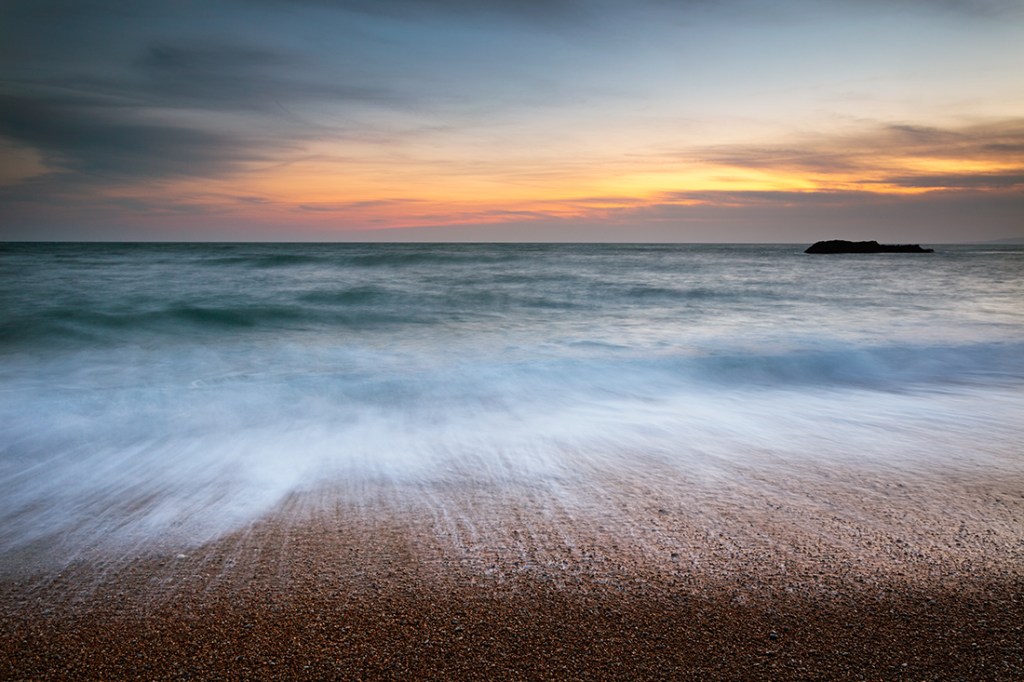 The beach at Durdle Door, Dorset. Canon 5D MkII. This is an old image that I decided to reprocess using current technology. The results seem much improved.