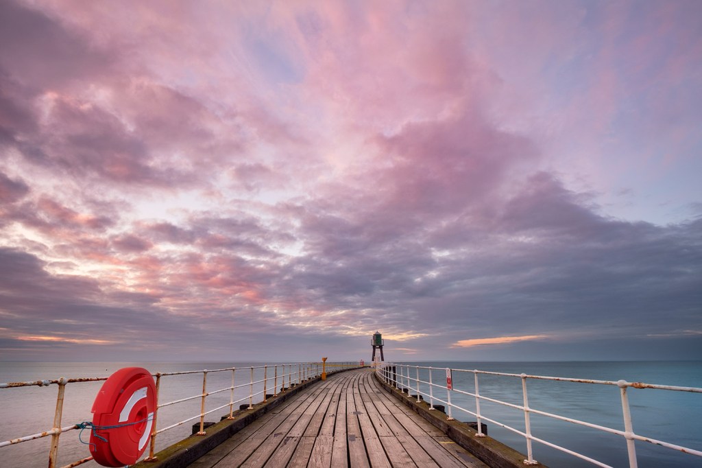Whitby Pier at Sunset. v